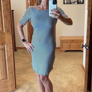 Form fitting striped dress.